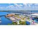 Aerial view of a marina filled with boats and a waterfront building at 6870 Willowshire Way, Bradenton, FL 34212