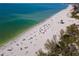 Aerial view of beach with people and lifeguard at 3816 6Th Ave, Holmes Beach, FL 34217