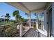 Balcony with access from bedroom, offering a courtyard view at 3816 6Th Ave, Holmes Beach, FL 34217