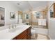 Clean bathroom with a tub and shower combo at 3816 6Th Ave, Holmes Beach, FL 34217