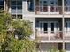 Two-story building with balconies and white railings at 3816 6Th Ave, Holmes Beach, FL 34217