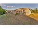 Landscaped backyard with screened porch at 5271 Beckham St, North Port, FL 34288
