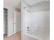 Bathroom with a shower/tub combo and a linen closet at 5271 Beckham St, North Port, FL 34288