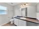 Clean bathroom with vanity, toilet, and updated fixtures at 5271 Beckham St, North Port, FL 34288
