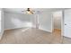 Primary bedroom with tile flooring and access to bathroom at 5271 Beckham St, North Port, FL 34288