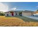 Front view of a newly built one-story house at 5271 Beckham St, North Port, FL 34288