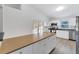 Modern kitchen with stainless steel appliances and an island at 5271 Beckham St, North Port, FL 34288