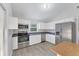 Updated kitchen, stainless steel appliances, and ample counter space at 5271 Beckham St, North Port, FL 34288