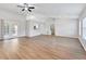 Spacious living room featuring hardwood floors and high ceilings at 5271 Beckham St, North Port, FL 34288