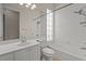 Clean bathroom with a bathtub, shower, and updated vanity at 5762 Benevento Dr, Sarasota, FL 34238