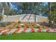 Attractive community entrance with landscaping and signage for The Isles at 5762 Benevento Dr, Sarasota, FL 34238