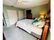 Bedroom with full bed and ceiling fan at 7315 8Th W Ave # 7315, Bradenton, FL 34209