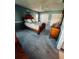 Bright bedroom with a queen-size bed and ample closet space at 7315 8Th W Ave, Bradenton, FL 34209