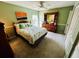 Bedroom with full bed and ceiling fan at 7315 8Th W Ave, Bradenton, FL 34209