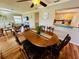 Open concept dining area with a view of the living room and kitchen at 7315 8Th W Ave, Bradenton, FL 34209