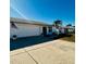 Front view of a house with a garage and driveway at 7315 8Th W Ave # 7315, Bradenton, FL 34209