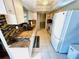 Modern kitchen with granite countertops and stainless steel appliances at 7315 8Th W Ave, Bradenton, FL 34209