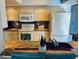 Well-equipped kitchen boasting granite countertops and modern appliances at 7315 8Th W Ave, Bradenton, FL 34209