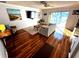 Relaxing living room with hardwood floors, a sofa and access to a patio at 7315 8Th W Ave, Bradenton, FL 34209