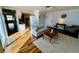 Living room with hardwood floors and comfy seating at 7315 8Th W Ave, Bradenton, FL 34209