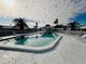 Community pool with plenty of lounge chairs at 7315 8Th W Ave, Bradenton, FL 34209