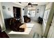 Sunroom with two armchairs and a ceiling fan at 7315 8Th W Ave, Bradenton, FL 34209