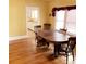 Dining room with hardwood floors and antique table at 1667 Laurel St, Sarasota, FL 34236