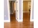 Hardwood floor hallway with access to other rooms at 1667 Laurel St, Sarasota, FL 34236