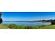 Panoramic view of the bay, featuring a pier and lush greenery at 333 N Shore Dr, Sarasota, FL 34234