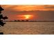 Beautiful sunset over the water, showcasing a serene waterfront landscape at 333 N Shore Dr, Sarasota, FL 34234