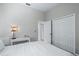 Spacious bedroom with a queen bed and built-in closet at 5200 Highbury Cir, Sarasota, FL 34238