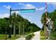 The Legacy Trail entrance with palm trees at 5200 Highbury Cir, Sarasota, FL 34238