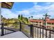 Private balcony overlooking the street and palm trees at 551 S Washington Dr, Sarasota, FL 34236