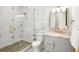 Spa-like bathroom with walk-in shower, gold fixtures, and stylish decor at 551 S Washington Dr, Sarasota, FL 34236