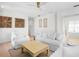 Relaxing living room with white sofas and light wood coffee table at 551 S Washington Dr, Sarasota, FL 34236