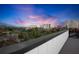 Stunning rooftop deck with city and water views at sunset at 551 S Washington Dr, Sarasota, FL 34236