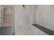 Large walk-in shower with a built-in seat and glass enclosure at 5554 Sand Fossil Ct, Sarasota, FL 34238