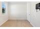 Bright bedroom with hardwood floors and a window with plantation shutters at 5987 Snowy Egret Dr, Sarasota, FL 34238