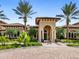 Community clubhouse with Mediterranean-style architecture at 5987 Snowy Egret Dr, Sarasota, FL 34238