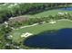 Aerial view of the golf course and lake at 6839 Chester Trl, Bradenton, FL 34202