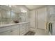 Elegant bathroom with double vanity, large shower, and modern finishes at 6839 Chester Trl, Bradenton, FL 34202