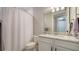 Bathroom with shower and granite countertop at 6839 Chester Trl, Bradenton, FL 34202