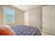Bedroom with window shutters and closet at 6839 Chester Trl, Bradenton, FL 34202