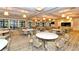 Elegant community room with tables and chairs at 6839 Chester Trl, Bradenton, FL 34202
