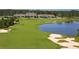 Golf course with lake and clubhouse view at 6839 Chester Trl, Bradenton, FL 34202