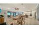 Spacious living room with open floor plan and view of kitchen at 6839 Chester Trl, Bradenton, FL 34202