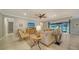 Bright living room with comfy seating and access to backyard patio at 6839 Chester Trl, Bradenton, FL 34202