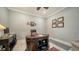 Home office with built-in desk and hardwood floors at 6839 Chester Trl, Bradenton, FL 34202