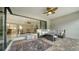 Covered patio with comfortable seating and view of the living area at 6839 Chester Trl, Bradenton, FL 34202
