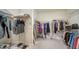Large walk-in closet with ample shelving and hanging space at 6839 Chester Trl, Bradenton, FL 34202